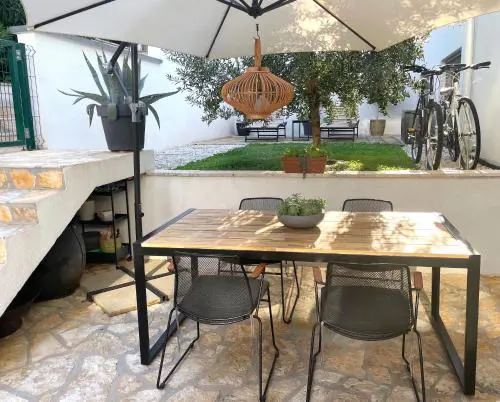 Great outdoor living steps away from the beach