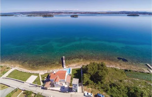 Four-Bedroom Holiday Home In Tkon