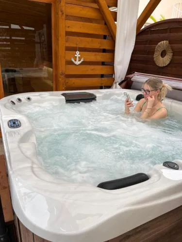 Gabi Appartementhaus mit Jakuzzi, Sauna und Stand Up Paddle Board