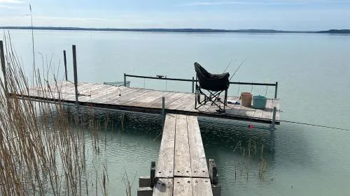 Retro Lakefront House With A Dock