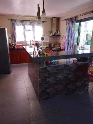Enchanting Bungalow in Chemin Grenier with Jacuzzi and Garden