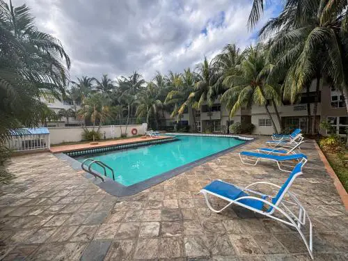 Charming Apartment with Pool View Near the Beach