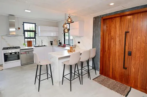 Smart & Modern 2BR Home in Secure Gated Area