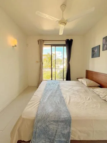 Coastal Charm Apartment l 2 Bedrooms situated on second floor l Mont Choisy l Shared Pool l Fully Equipped Kitchen l Parking Space l Close to all amenities
