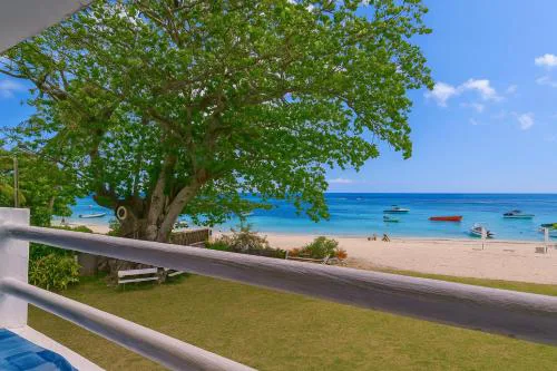 Serge's Beachfront by Serenity