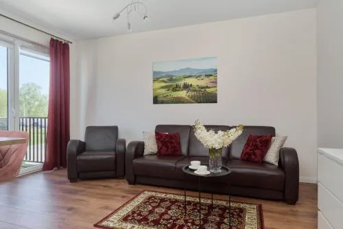 Comfy Apartment with Parking & Balcony by Noclegi Renters