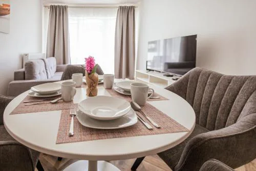 Grey Harmony Apartment by UniqueRent