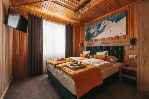 Apartamenty Grand Tatry - sauna i jacuzzi wliczone w cenę pobytu - 10 minut pieszo od Term Bania - znajdują się one w budynku obok