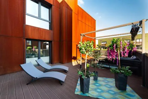 Apartment with private terrace by NEARTO PL