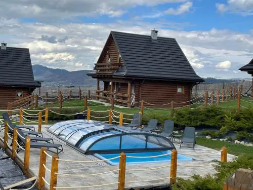 Domki Zagroda Domek z bala z basenem & sauna & balia z hydromasażem