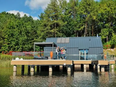 Holiday home with private lake and beach