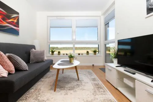 Modern Apartment with Parking and Balcony in Gdynia by Noclegi Renters