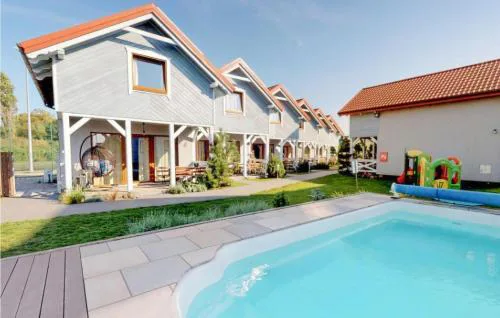 Gorgeous Home In Karwia With Heated Swimming Pool