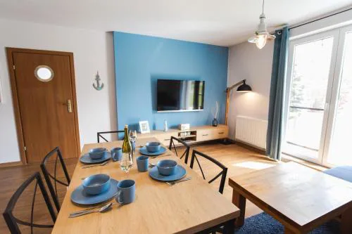 Apartament Łajba Łeba z basenem i kortem tenisowym