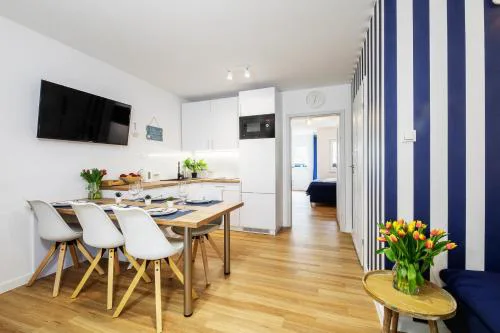 Apartament 2B Niebieskie Apartamenty Poddąbie z basenem krytym, odkrytym, salą zabaw, animacjami