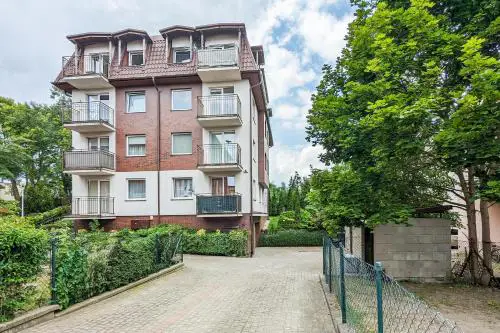 Wakacyjny Apartament z Parkingiem 500 m od Plaży by Noclegi Renters