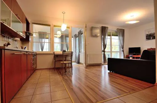 Stylowy Apartament z Parkingiem Victus by Noclegi Renters