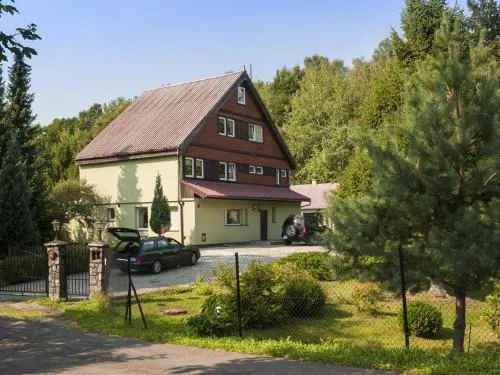 Half of a holiday home, huge garden, pond