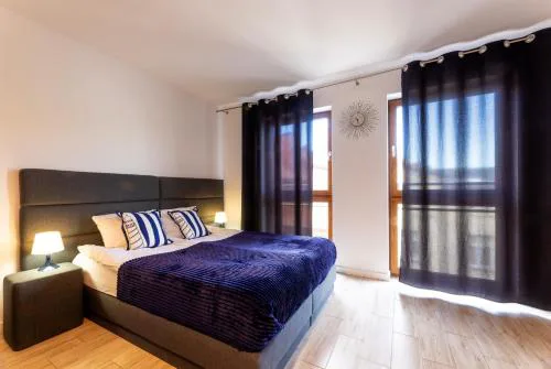 Apartamenty Bałtyckie - Grand Baltic - WIFI, Klimatyzacja, Sala Zabaw, Taras wypoczynkowy, centrum Ustki