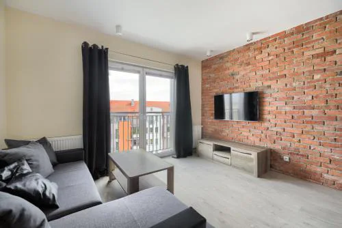 Warta River Loft Apartment by BookingHost