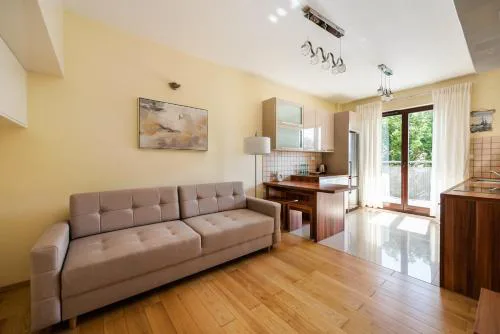 Green District 2BR AirConditioned P by BookingHost
