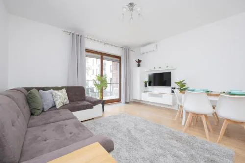 Klimatyzowany Apartament z Parkingiem w Stolicy by Noclegi Renters