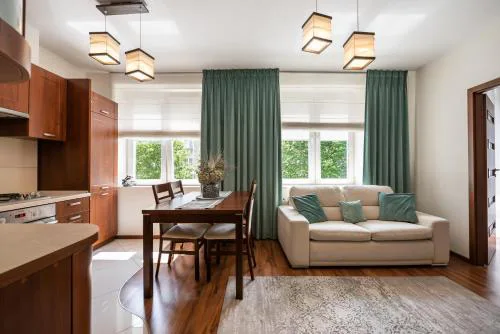Ogrodowa Warm Wood Apartment by BookingHost