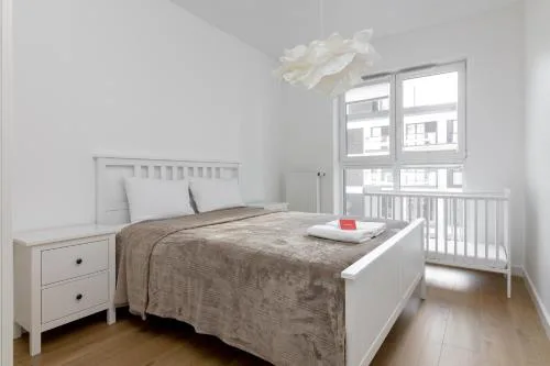 Rozłogi Sunny Apartment by BookingHost