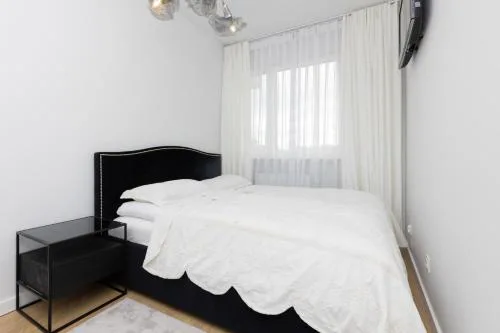 Stylish Apartment Przedpole with Balcony & Parking by Noclegi Renters