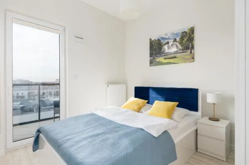 Wola Chic Blue Apartment by BookingHost