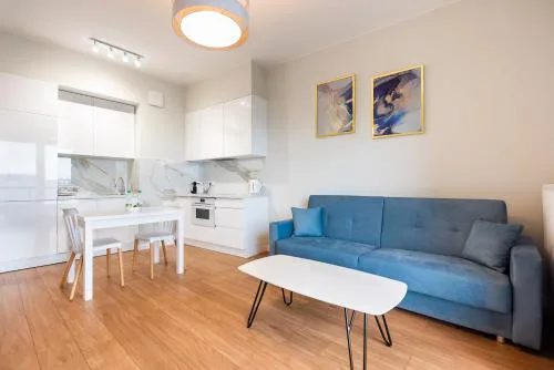 Wola Lush Apartment by BookingHost