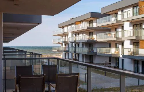Przytulne i Nowoczesne Apartamenty Sun Seasons 24 w Dziwnowie z Parkingiem by Noclegi Renters