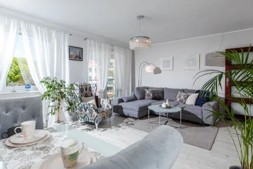 Jasnoszary Apartament Sun Seasons 24 w Kołobrzegu Blisko Morza by Noclegi Renters