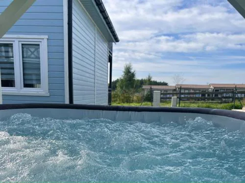 Comfortable holiday houses near the sea, Rewal