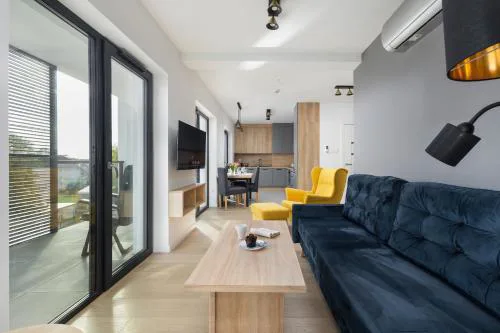 Air-Conditioned Seaside Apartment with Parking & Balcony by Noclegi Renters