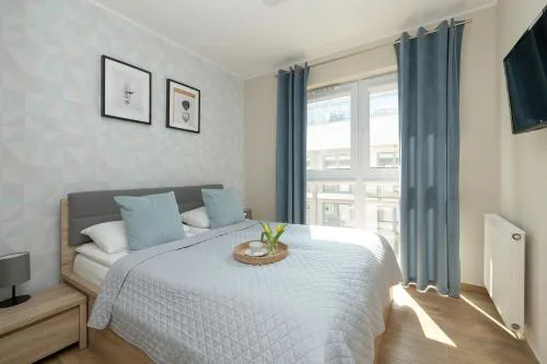 Jasny Apartament Sun Seasons 24 z Umeblowanym Balkonem i Parkingiem by Noclegi Renters