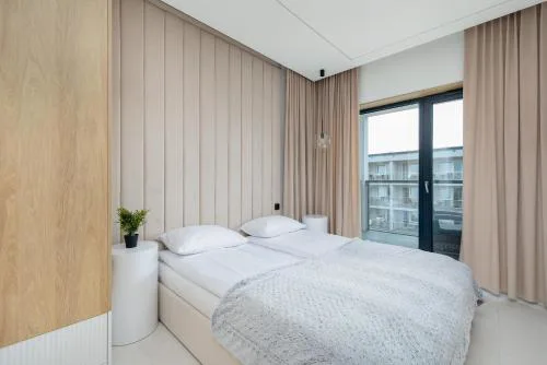 Nowoczesny Apartament Przy Plaży z Parkingiem by Noclegi Renters