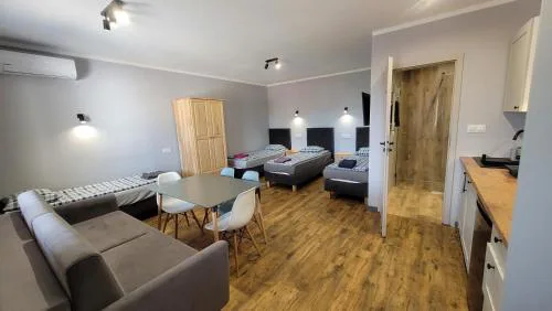 Wrzosowe Wzgórze 5 - Studia i Apartamenty