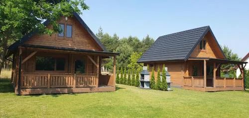 Domki z bala przy plaży Orle Jezioro Głuszyńskie