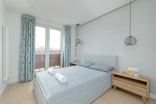 Charming Apartment with a Balcony in Rzeszów by Noclegi Renters