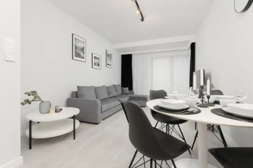 Air-Conditioned Apartment with Balcony & Parking by the Park in Łódź by Renters Prestige