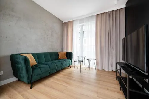 Manufaktura Modern Apartment by BookingHost