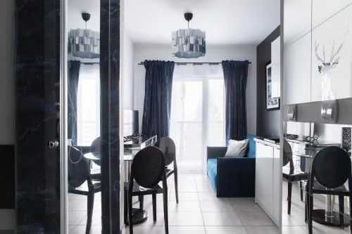 Nowoczesny apartament GLAMOUR Łódź z prysznicem pośrodku