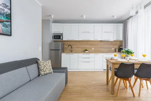 Seaside Apartment Rybacka with Parking by Noclegi Renters
