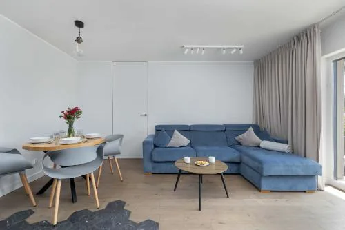 Spacious Apartment with Parking in Międzywodzie by Noclegi Renters