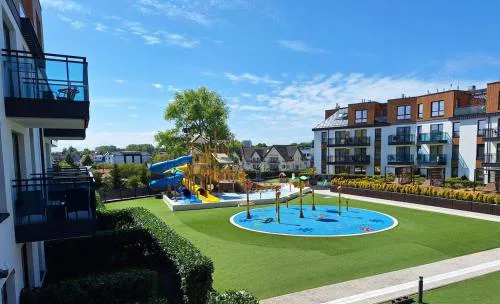 Family SUN & FUN Apartment & Water Park Patio at Belmare Aqua Resort