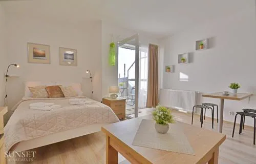 Sunset Apartments - Plac Słowiański 10 - słoneczna kawalerka w centrum miasta