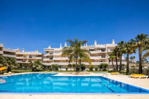 Stylish 2BR Apartment with Pool Parking & WiFi