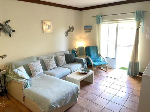 Coastal holiday home with shared pool