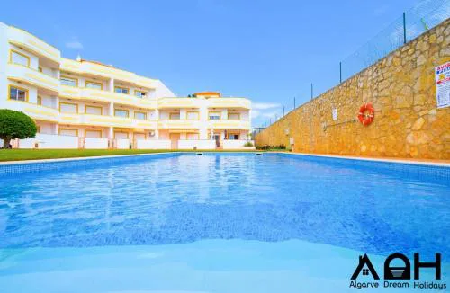 Sunny Terrace facing the pool and barbecue by Algarve Dream Holidays